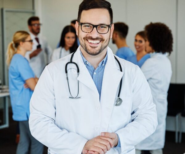 Portrait of a group of doctors and health care workers in the office hospital